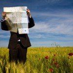 businessman lost in field using a map A compassionate guide to cremation procedures