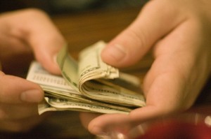 cash hands Photo by J. Rosenfeld