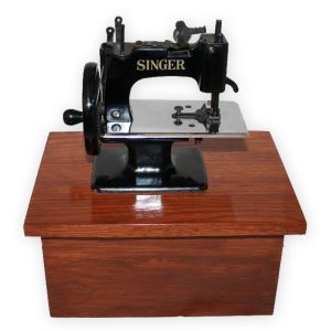 Small sewing machine urn